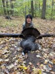 Griffin Beaver, age 7, of Craigsville, W.Va. with his first turkey.  
