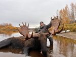 Jerry Dean of Romney, W.Va.  with a moose taken during a DIY Moose Hunt in Alaska's Yukon territory .
