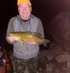 John T. (Tuck) Martin of Keyser with a nice 20.25 inch, 3.75 LB. smallmouth bass caught near the confluence of the North and South branches of the Potomac River in Hampshire County in October 2022. 