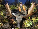 Kevin Rose of Dellslow, W.Va. shows off a moose killed on a hunt in Canada.  The inside spread was 51 inches,  13 points . Est weight close to 1000 lbs.
