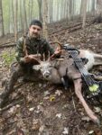 Luke Grimm of Charleston, W.Va. shows off the first buck he ever killed with a bow, taking in the fall of 2022
