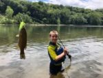Tucker Wiant, age 10 of Martinsburg, W.Va. with his first ever smallmouth caught on a bait caster from the Potomac River. 