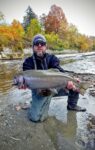 Dean Herrod of Philippi, W.Va. with a steelhead caught on Walnut Creek in Fairview, PA.  29.5 inches and 12 pounds 4 ounces. 
